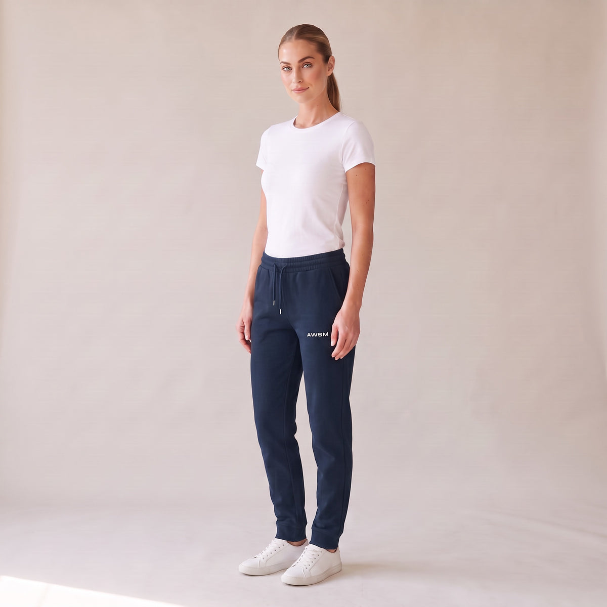Basecamp Heavyweight Sweatpants — AWSM Field in French Navy, three-quarter view on the AWSM house model