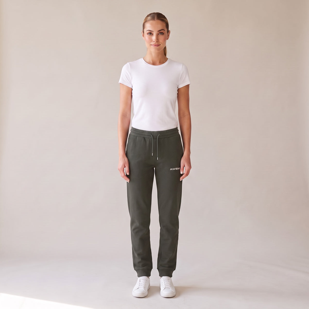 Basecamp Heavyweight Sweatpants — AWSM Field in Khaki Green, front view on the AWSM house model