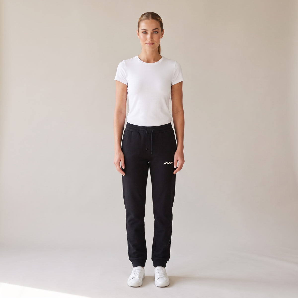 Basecamp Heavyweight Sweatpants — AWSM Field in Onyx Black, shown on the AWSM house model