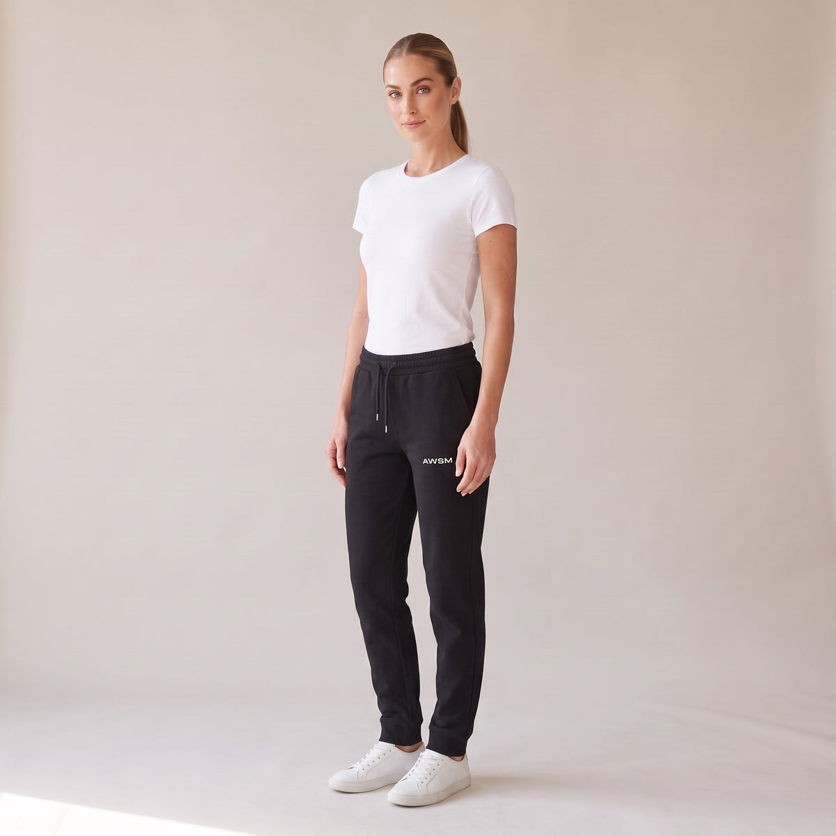 Basecamp Heavyweight Sweatpants — AWSM Field in Onyx Black, three-quarter view on the AWSM house model