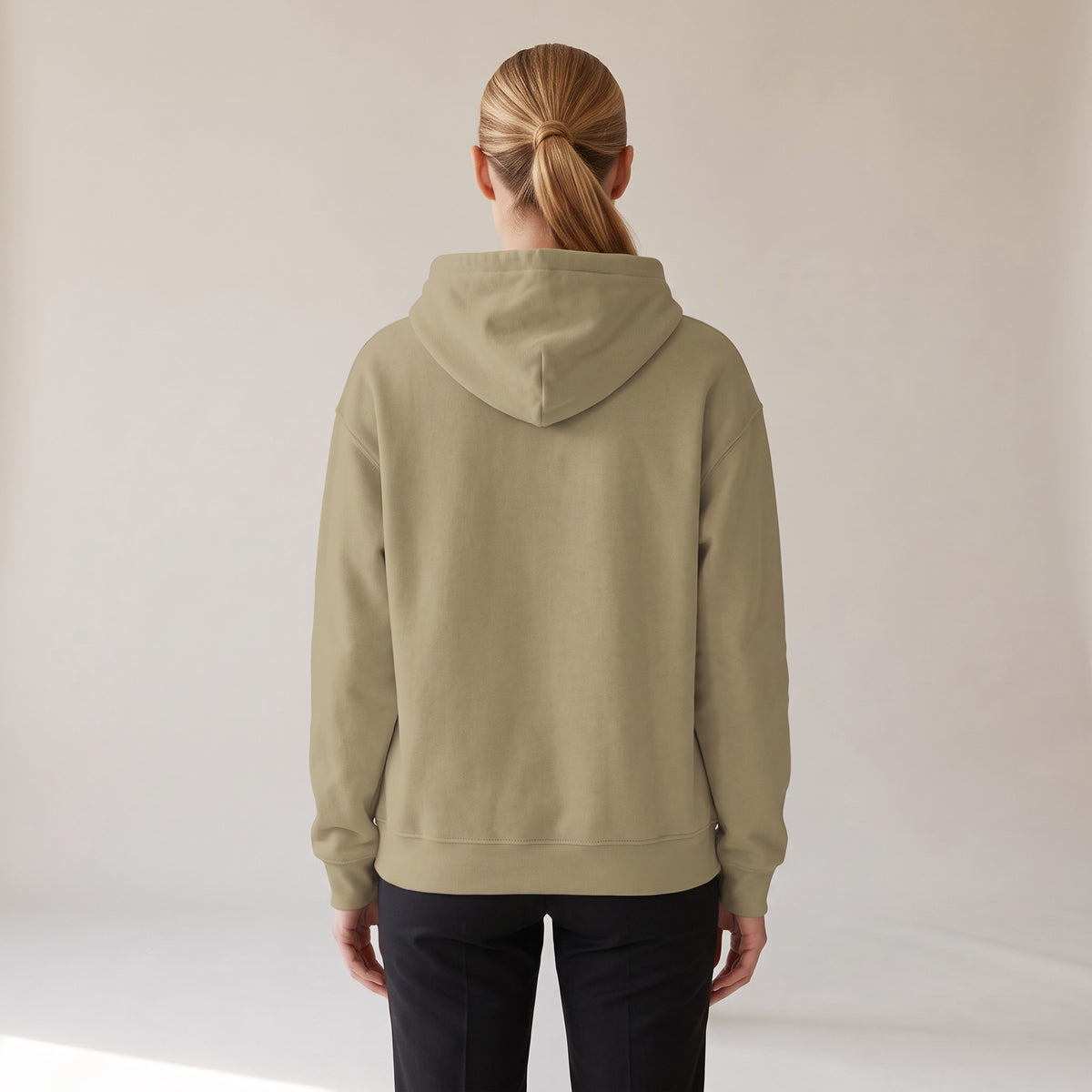 Bordeaux Relaxed Hoodie — AWSM Atelier in Dune Sand, back view on the AWSM house model