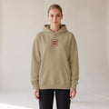 Bordeaux Relaxed Hoodie — AWSM Atelier in Dune Sand, shown on the AWSM house model
