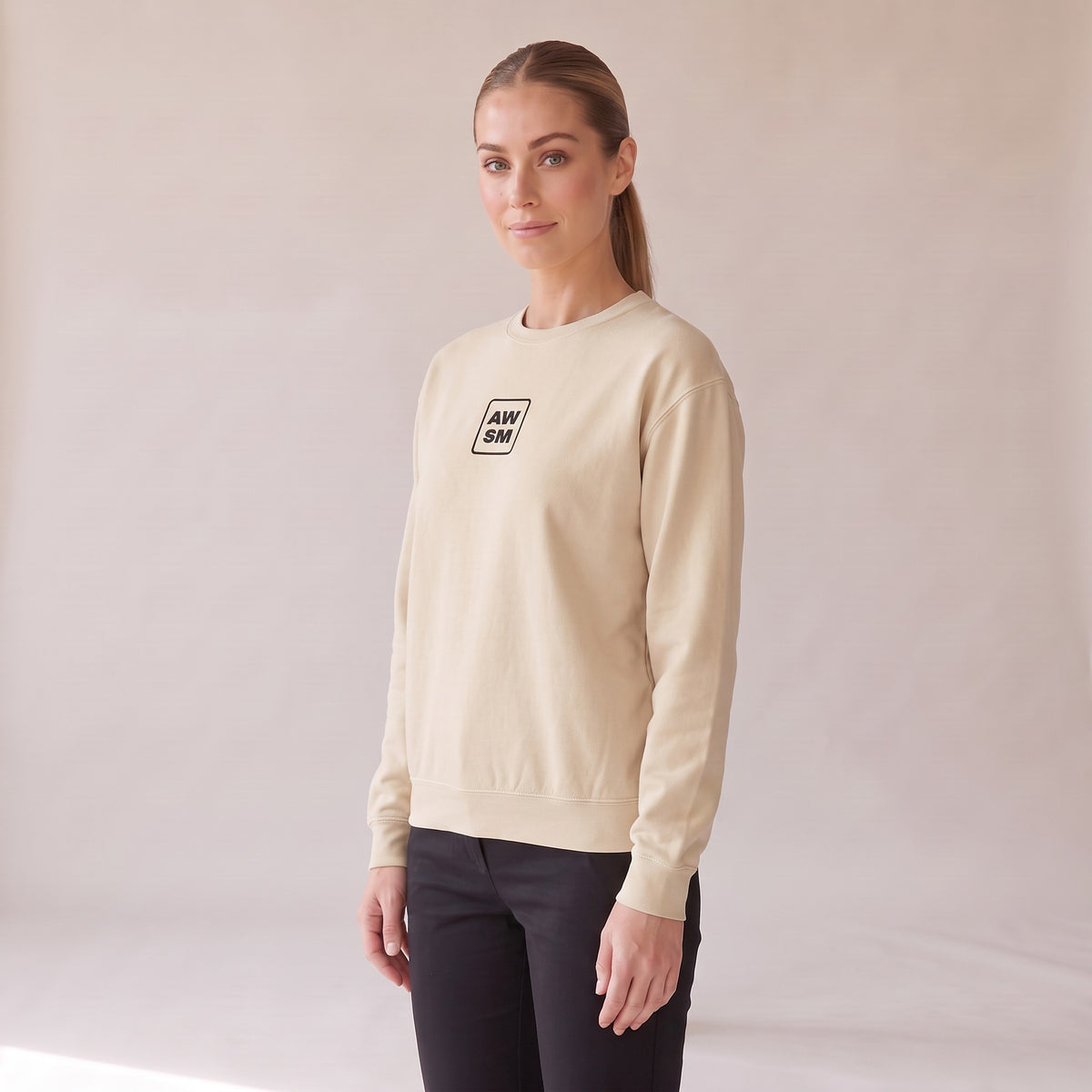 Brioche Crewneck — AWSM Atelier in Antique Ivory, three-quarter view on the AWSM house model