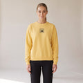 Brioche Crewneck — AWSM Atelier in Butter Cream, shown on the AWSM house model
