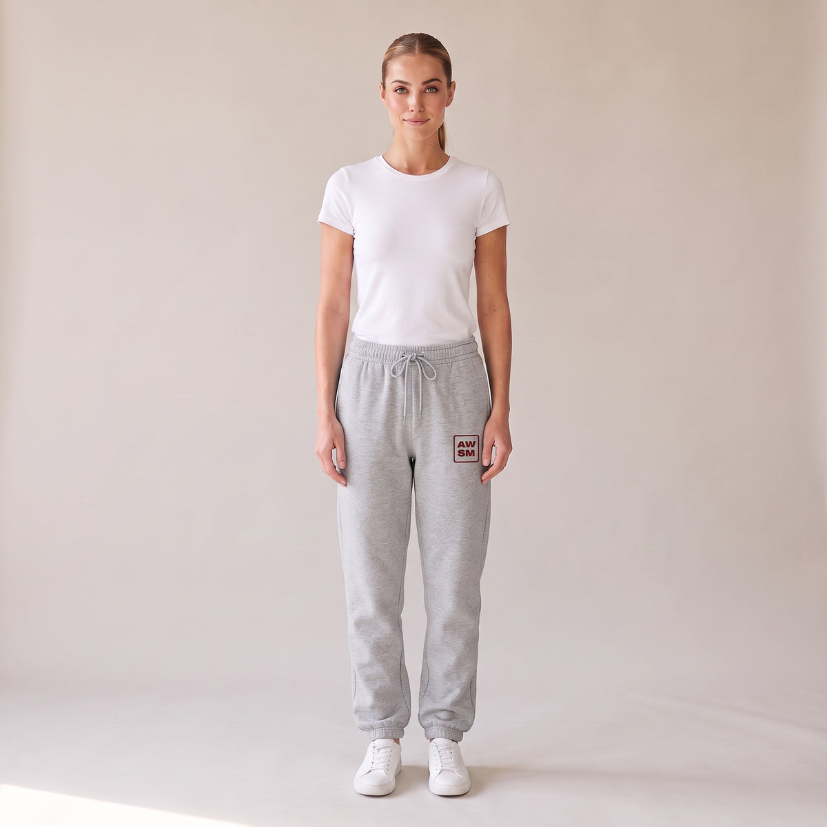 Cabernet Heavyweight Sweatpants — AWSM Atelier in Athletic Heather Grey, front view on the AWSM house model