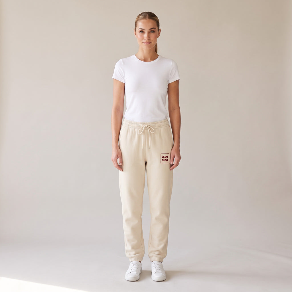 Cabernet Heavyweight Sweatpants — AWSM Atelier in Stone Dust, shown on the AWSM house model