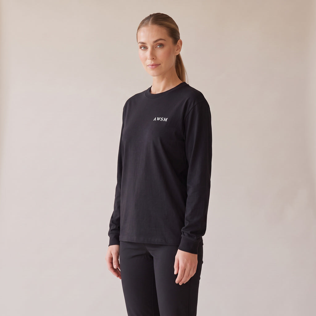 Crépuscule Long Sleeve Tee — AWSM Maison in Onyx Black, three-quarter view on the AWSM house model
