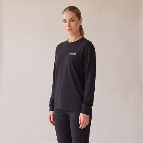 Crépuscule Long Sleeve Tee — AWSM Maison in Onyx Black, three-quarter view on the AWSM house model