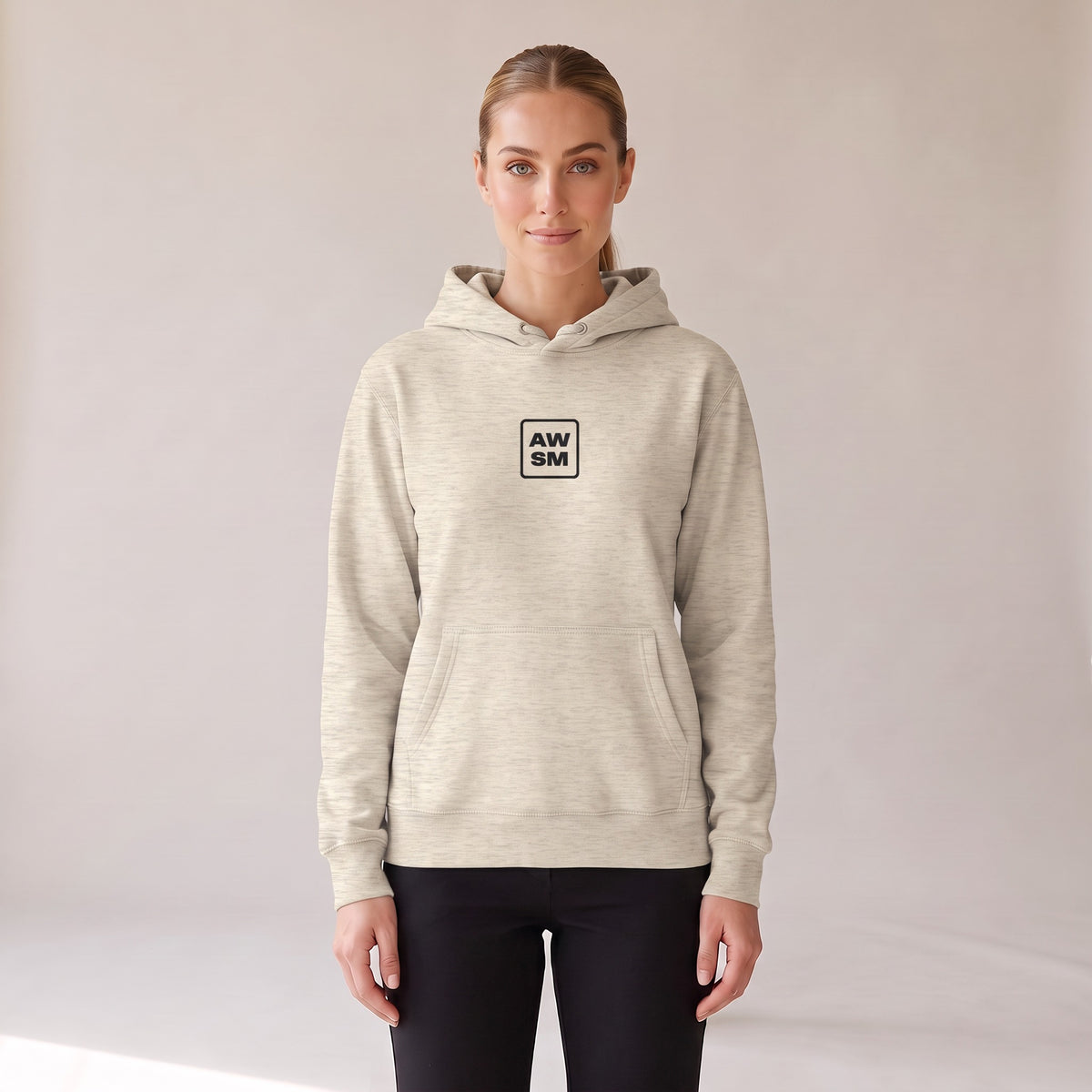 Galerie Hoodie — AWSM Atelier in Oat Heather, front view on the AWSM house model