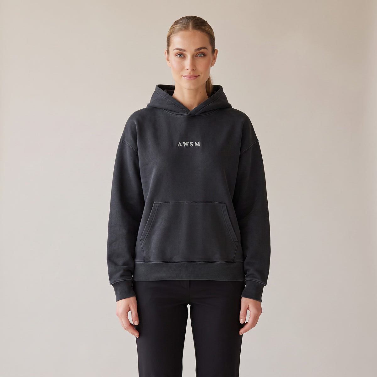 Héritage Vintage Hoodie — AWSM Maison in Volcanic Black, shown on the AWSM house model