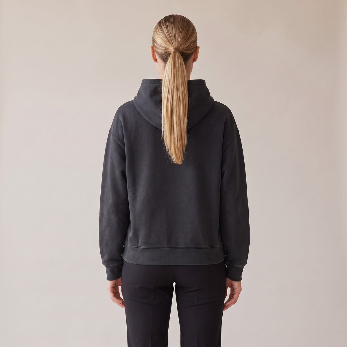 Héritage Vintage Hoodie — AWSM Maison in Volcanic Black, back view on the AWSM house model