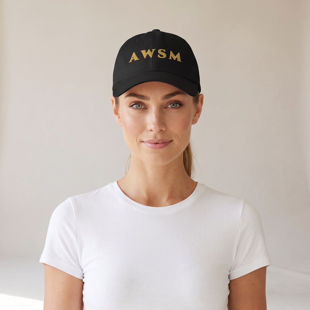 Laurel Dad Hat — AWSM Aurum in Onyx Black, shown on the AWSM house model