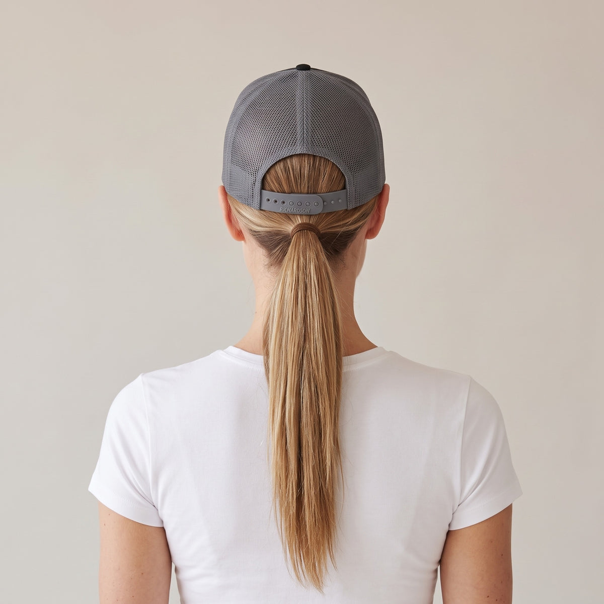 Minuit Trucker Cap — AWSM Maison in Onyx / Graphite, back view on the AWSM house model