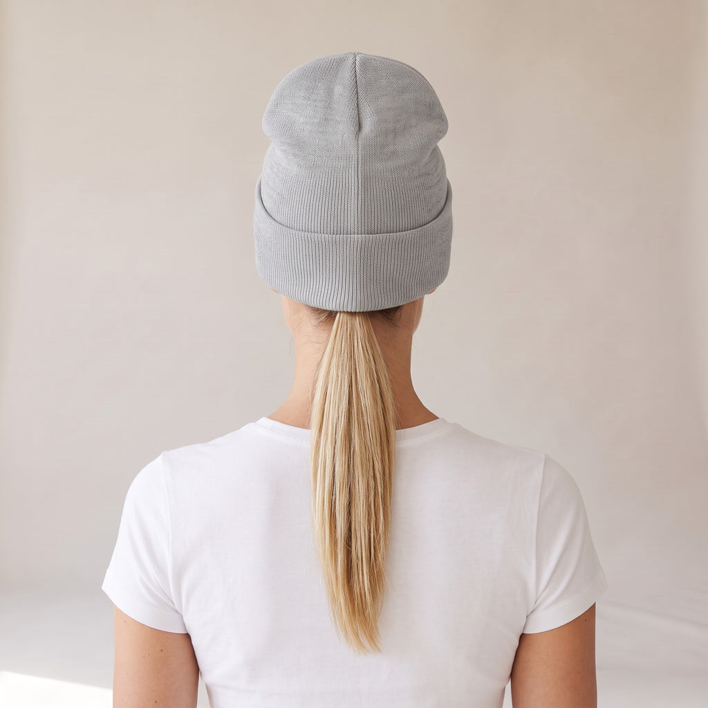 Neige Cuffed Beanie — AWSM Atelier in Cloud Heather Grey, back view on the AWSM house model
