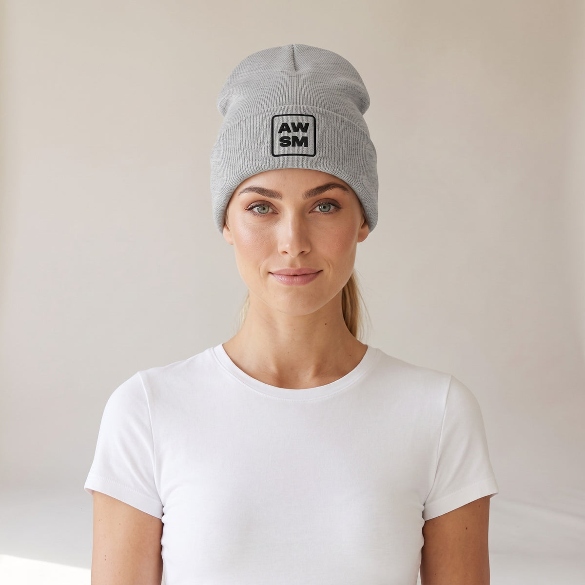 Neige Cuffed Beanie — AWSM Atelier in Cloud Heather Grey, shown on the AWSM house model
