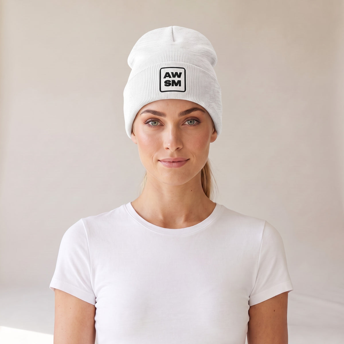 Neige Cuffed Beanie — AWSM Atelier in Pearl White, front view on the AWSM house model