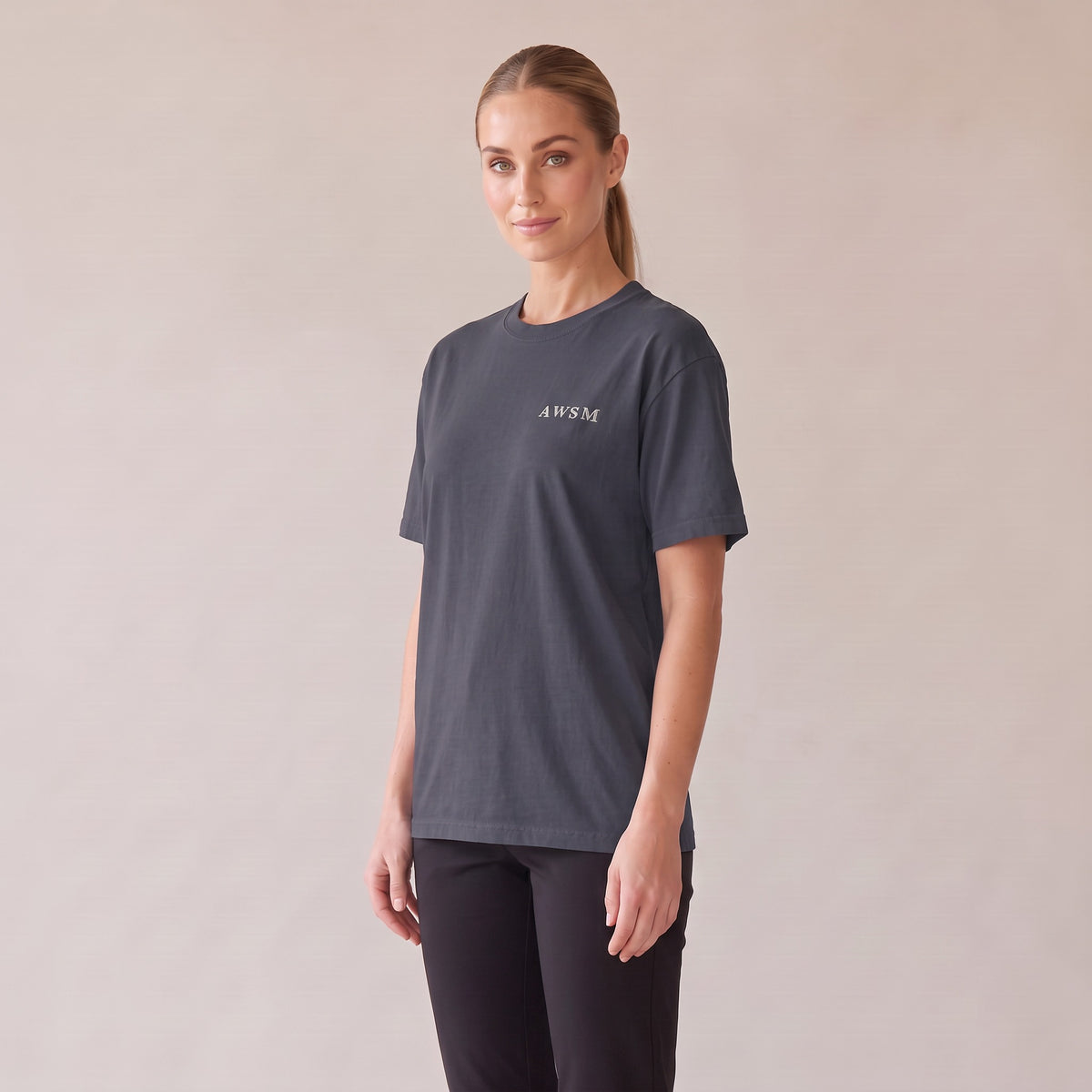 Nocturne Heavyweight Tee — AWSM Maison in Midnight Navy, three-quarter view on the AWSM house model