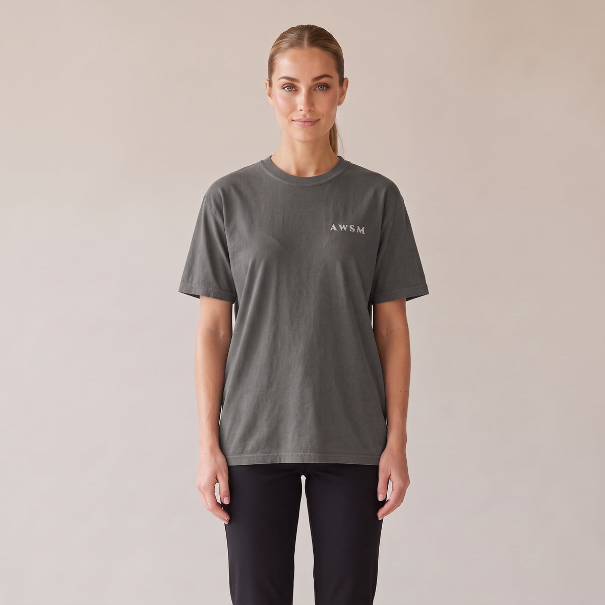 Nocturne Heavyweight Tee — AWSM Maison in Peppercorn Grey, front view on the AWSM house model