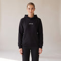 Opéra Hoodie — AWSM Maison in Onyx Black, shown on the AWSM house model
