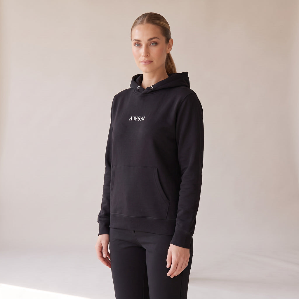 Opéra Hoodie — AWSM Maison in Onyx Black, three-quarter view on the AWSM house model