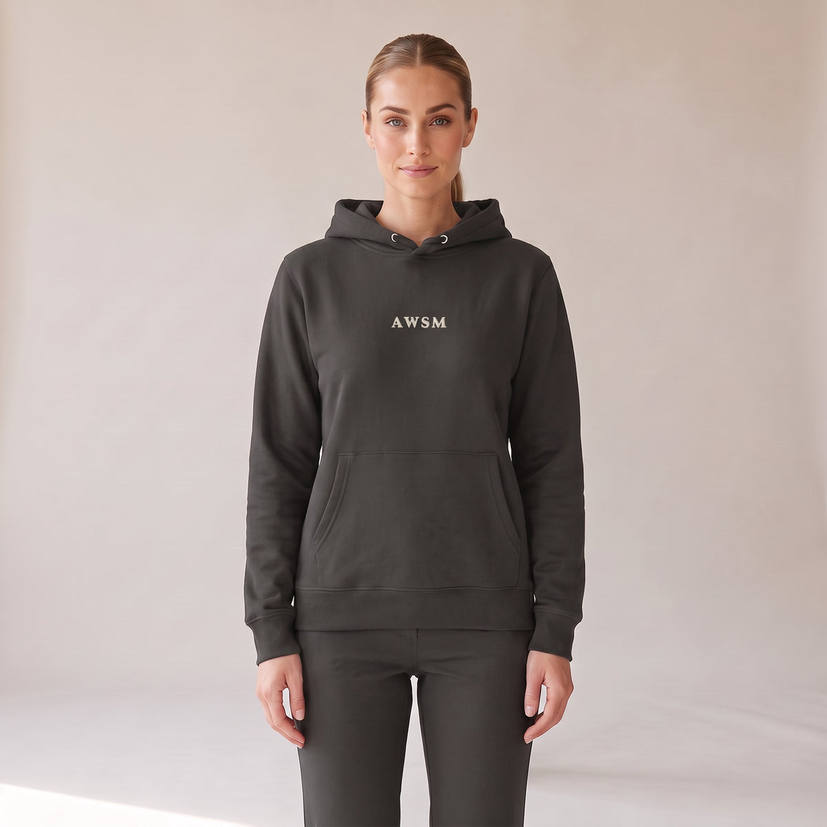 Opéra Hoodie — AWSM Maison in Washed Onyx, front view on the AWSM house model
