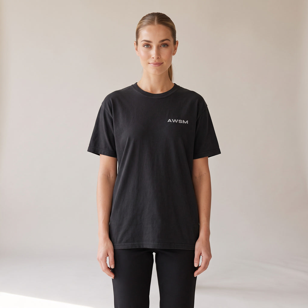 Outpost Heavyweight Tee — AWSM Field in Onyx Black, shown on the AWSM house model