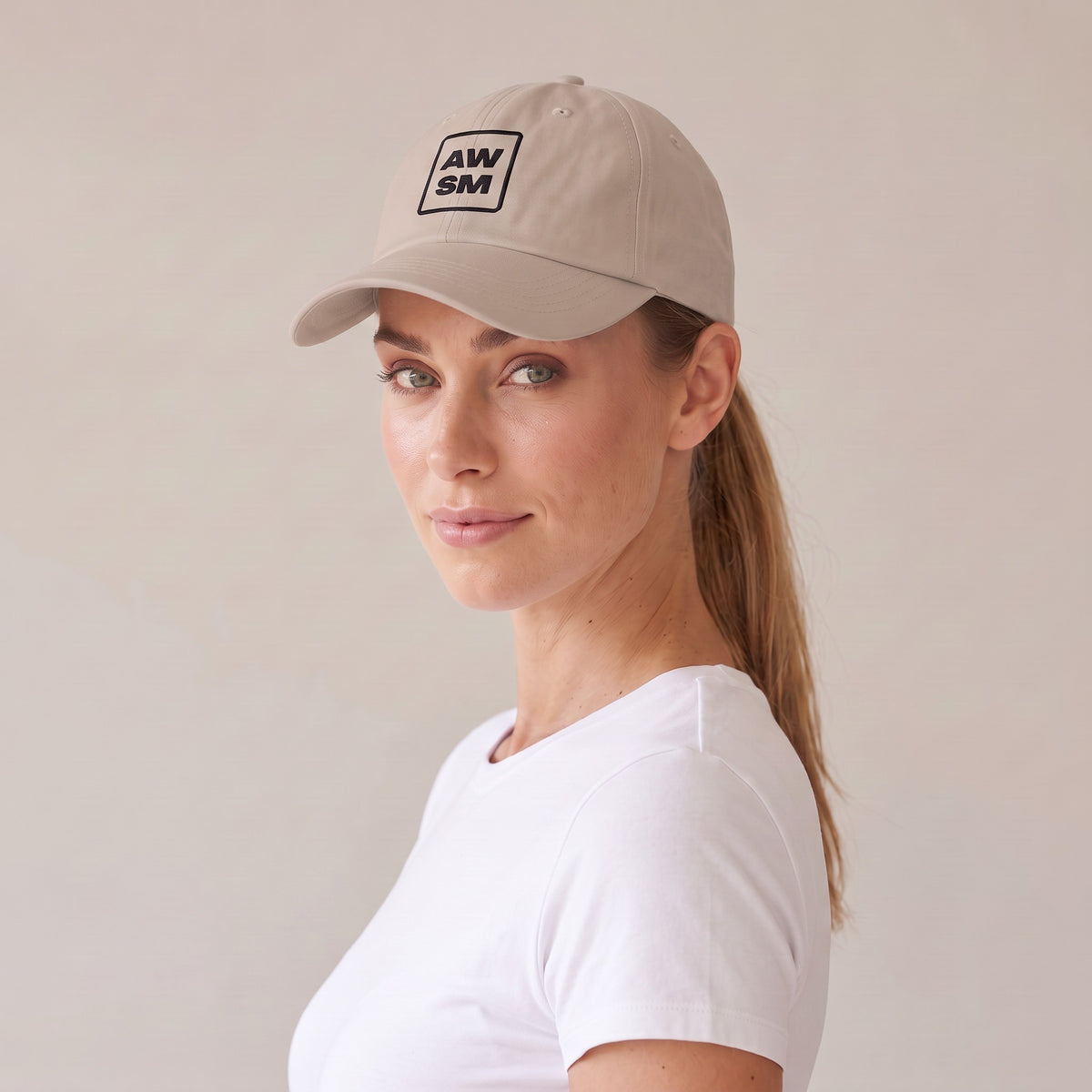 Plâtre Dad Hat — AWSM Atelier in Limestone, three-quarter view on the AWSM house model