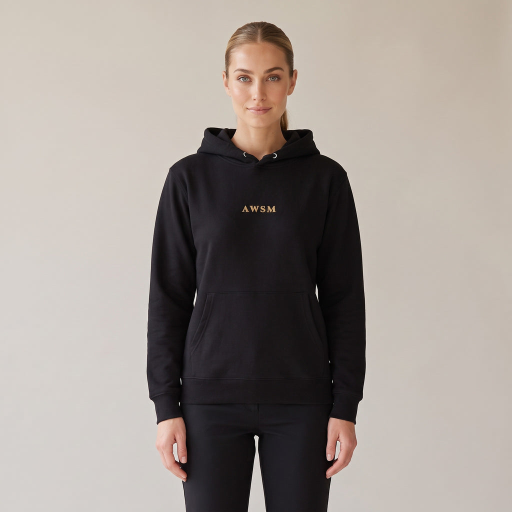 Regalia Hoodie — AWSM Aurum in Onyx Black, shown on the AWSM house model