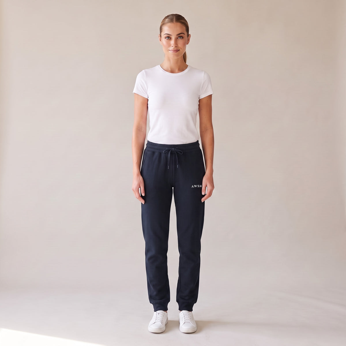 Repos Fleece Sweatpants — AWSM Maison in Midnight Navy, front view on the AWSM house model