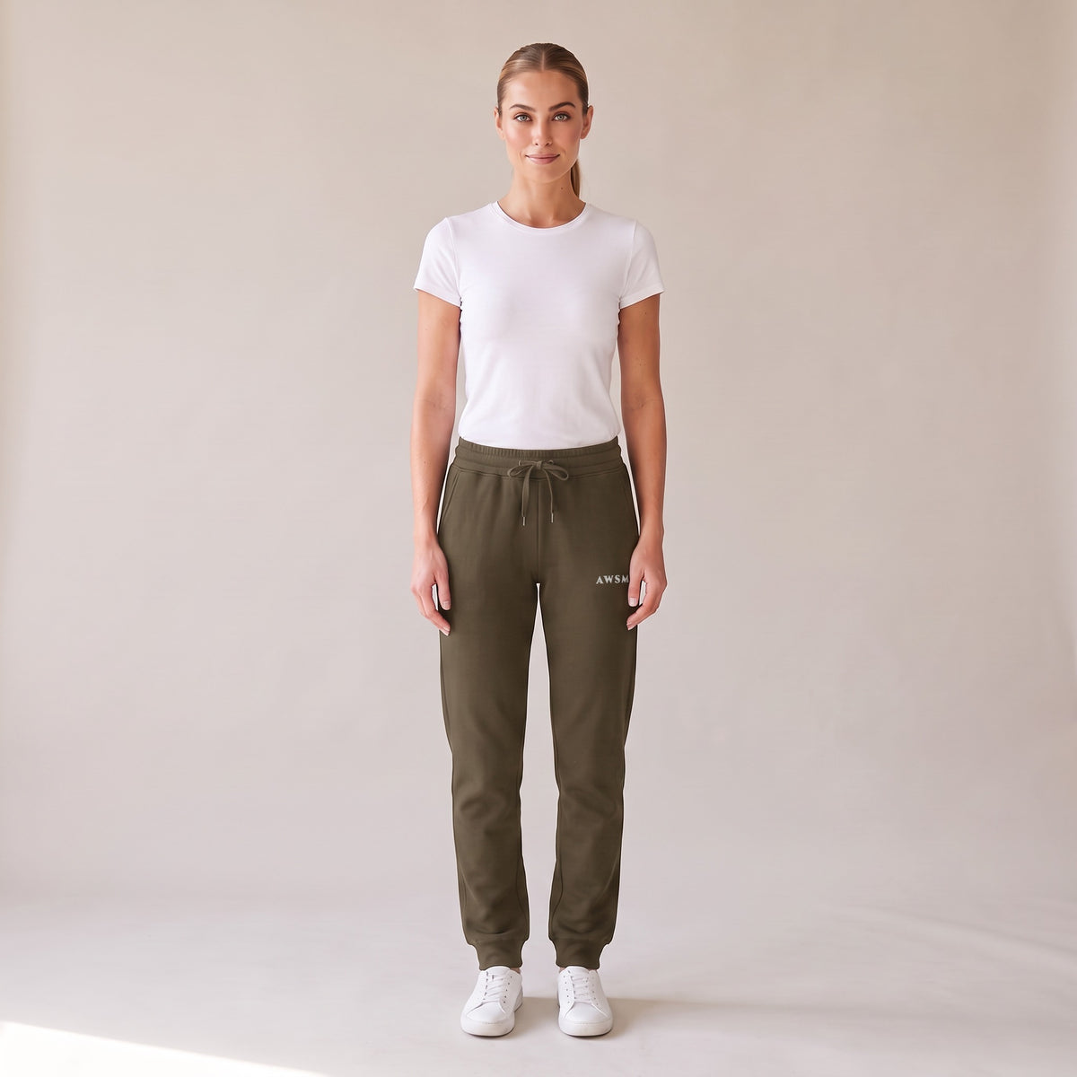 Repos Fleece Sweatpants — AWSM Maison in Olive Drab, front view on the AWSM house model