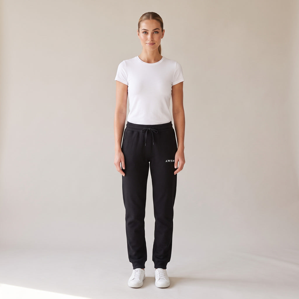 Repos Fleece Sweatpants — AWSM Maison in Onyx Black, shown on the AWSM house model