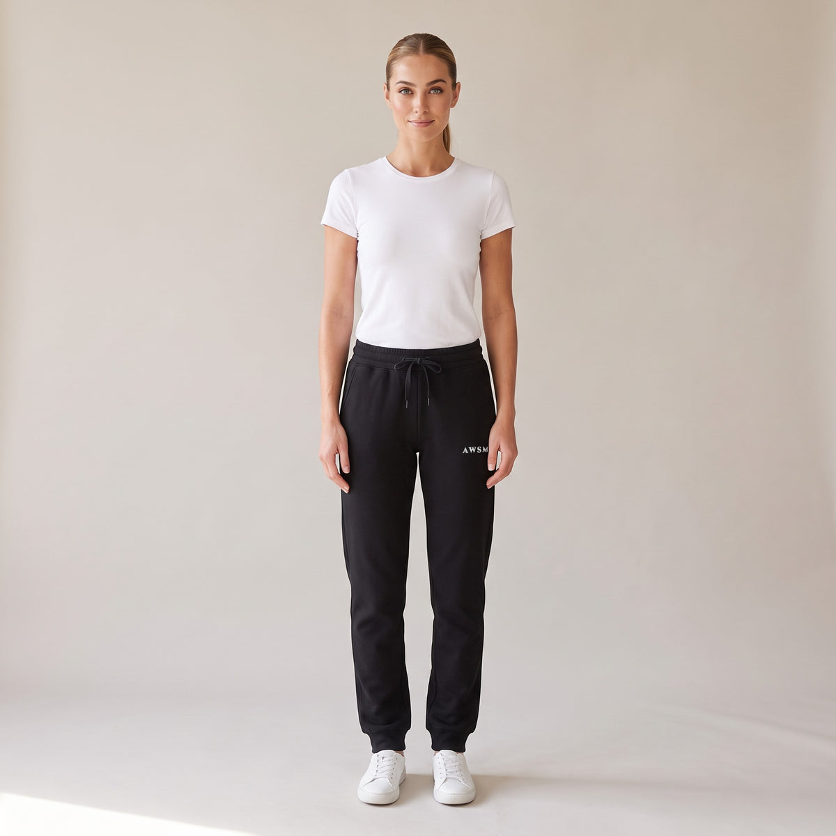 Repos Fleece Sweatpants — AWSM Maison in Onyx Black, shown on the AWSM house model