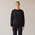 Salon Crewneck — AWSM Maison in Onyx Black, shown on the AWSM house model