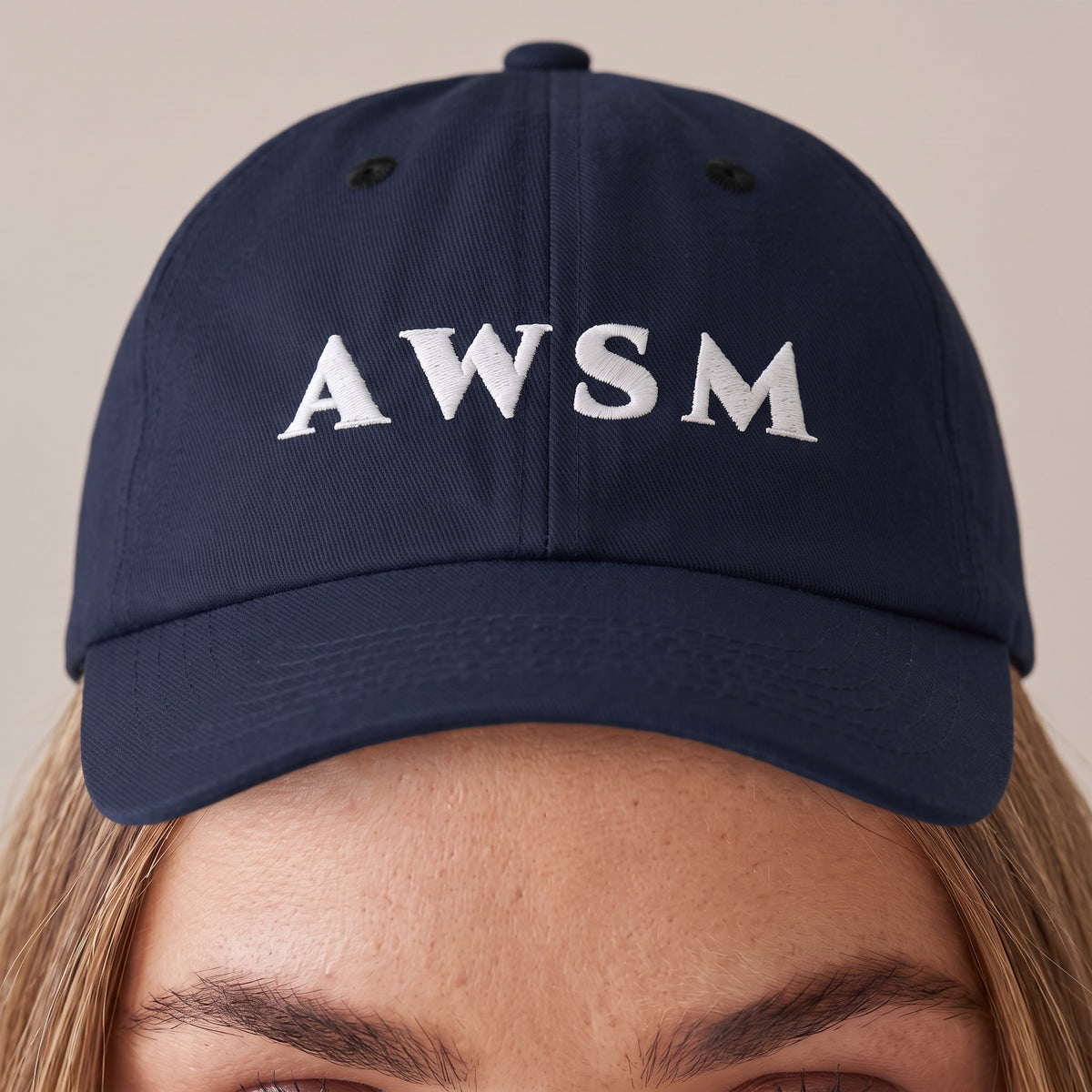 Soirée Dad Hat — AWSM Maison in Midnight Navy, close-up of the embroidery on the AWSM house model