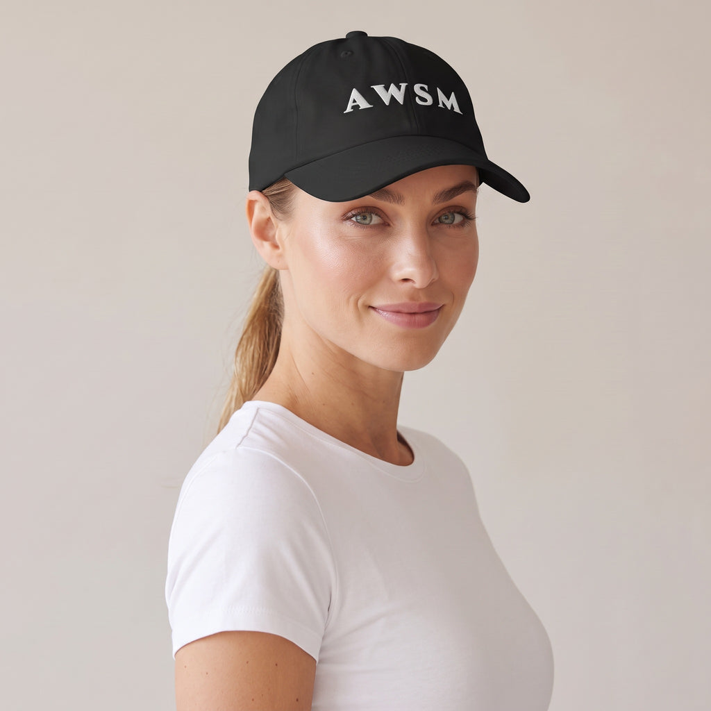 Soirée Dad Hat — AWSM Maison in Onyx Black, three-quarter view on the AWSM house model