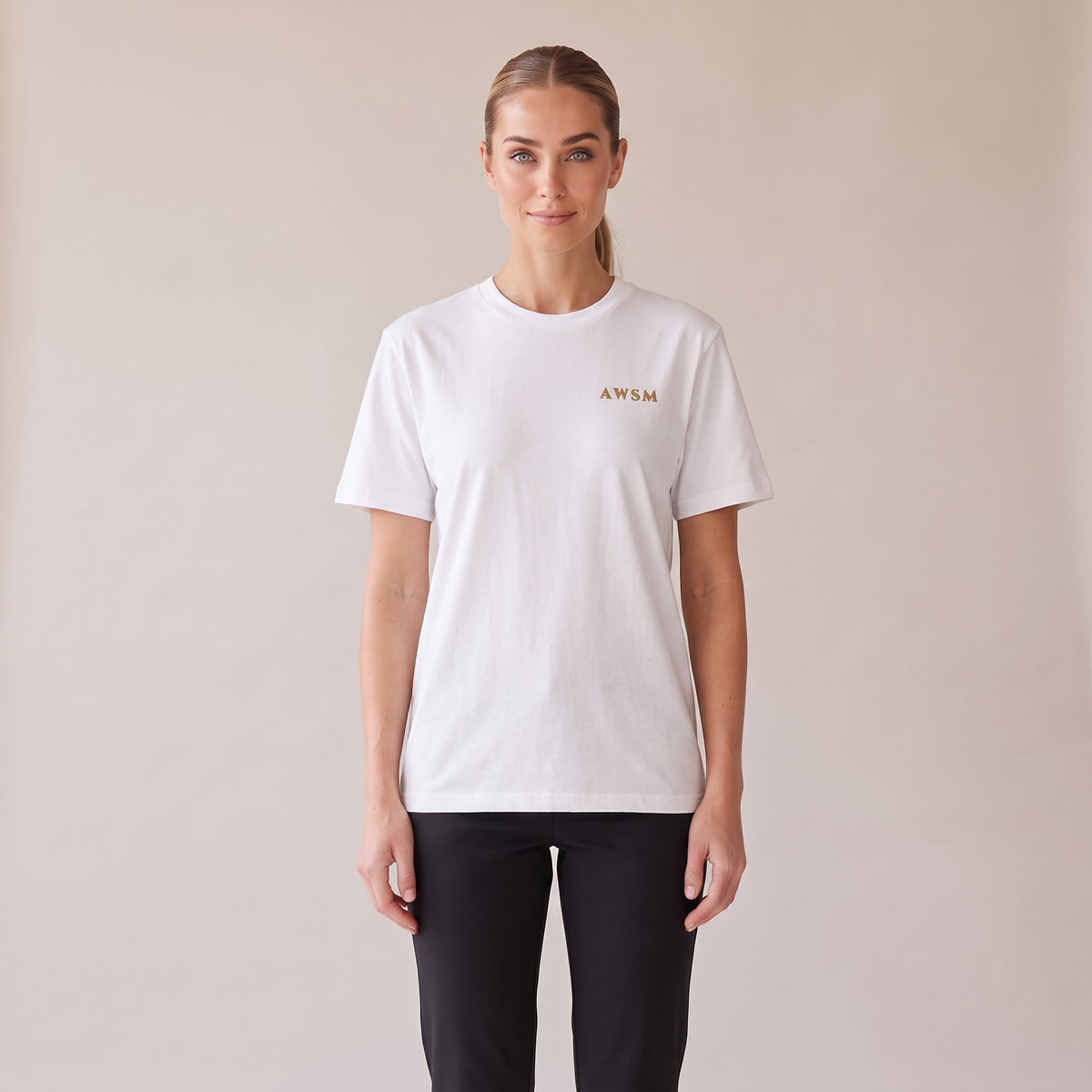 Sovereign Heavyweight Tee — AWSM Aurum in Pearl White, front view on the AWSM house model
