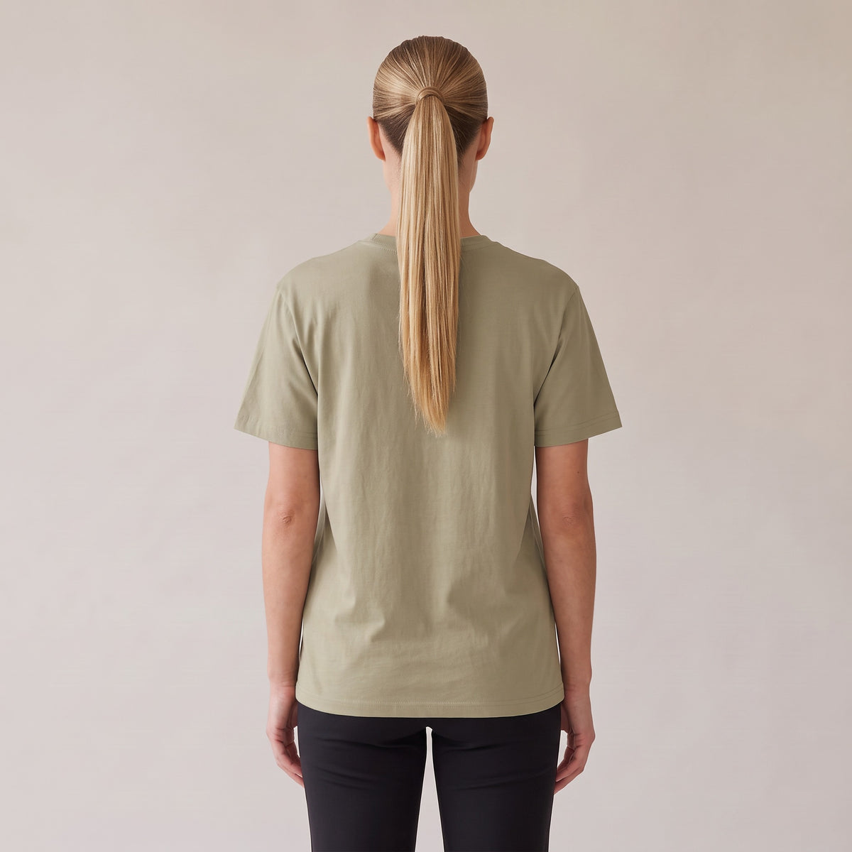 Studio Heavyweight Tee — AWSM Atelier in Sahara Khaki, back view on the AWSM house model
