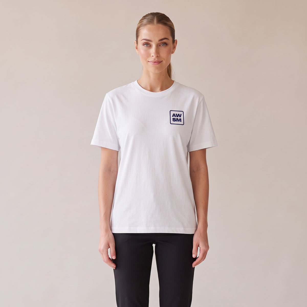 Terre Organic Tee — AWSM Atelier in Pearl White, front view on the AWSM house model