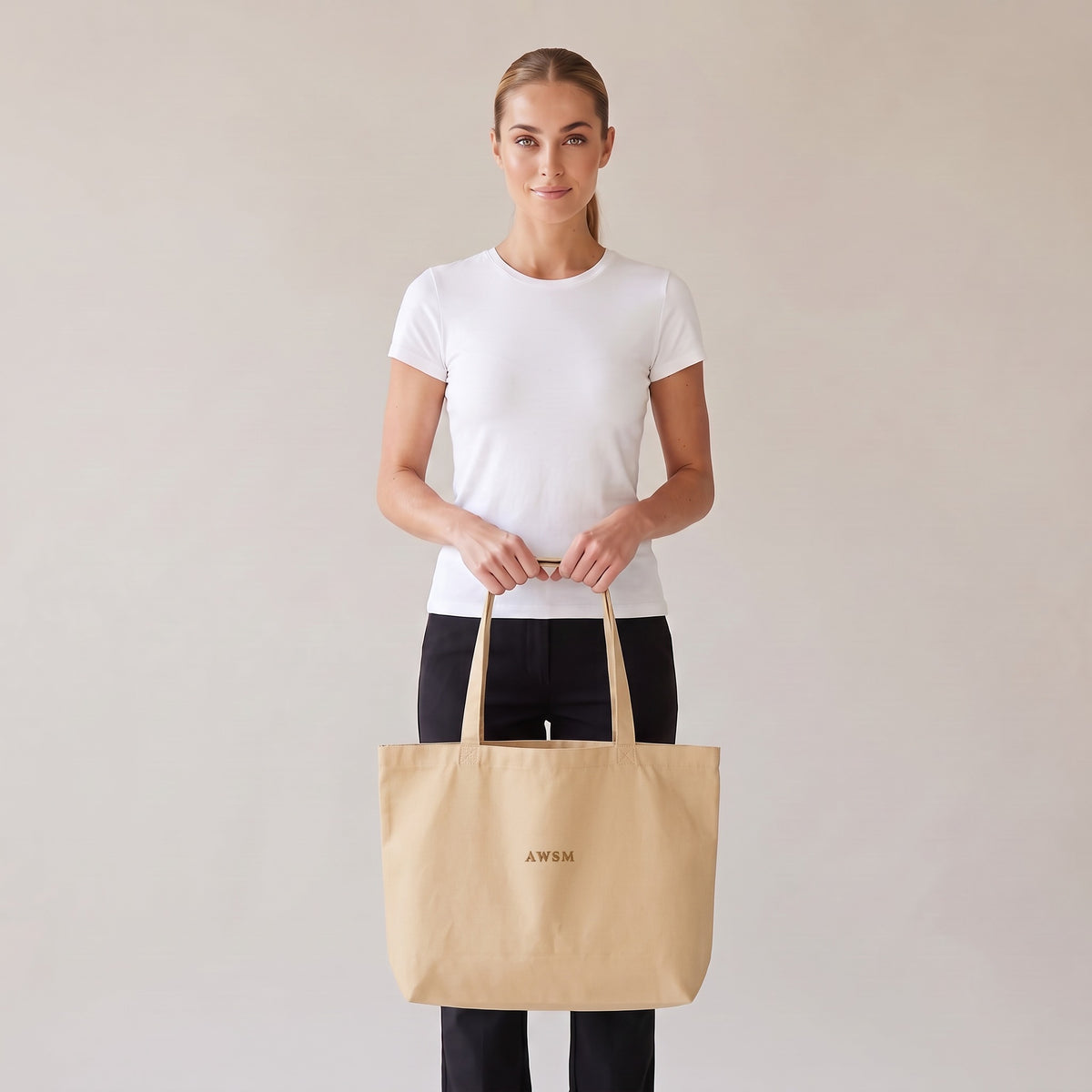 Trésor Twill Tote — AWSM Aurum in Oyster Cream, front view on the AWSM house model