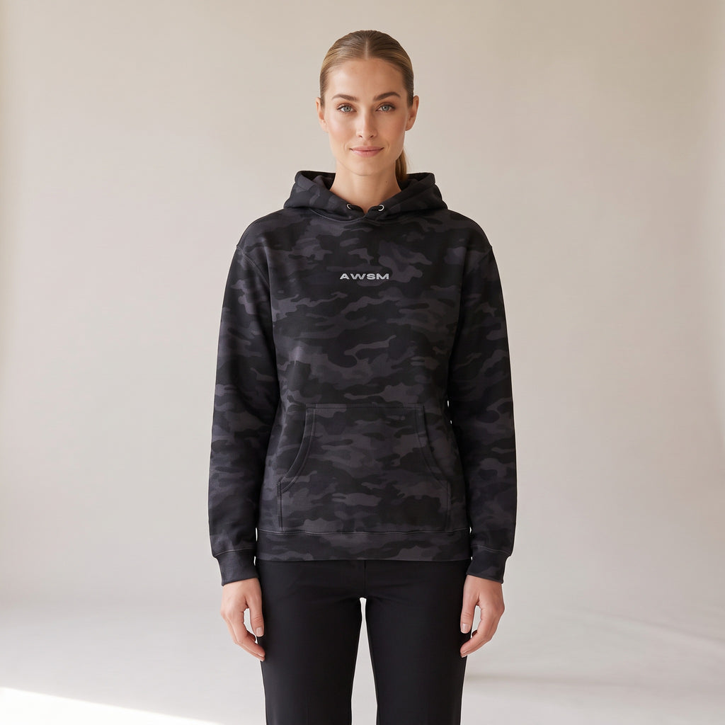 Vanguard Heavyweight Hoodie — AWSM Field in Night Camo, shown on the AWSM house model