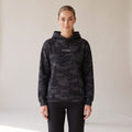 Vanguard Heavyweight Hoodie — AWSM Field in Night Camo, shown on the AWSM house model